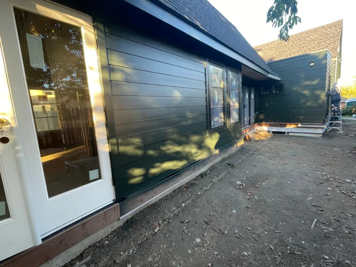 Repainted siding around the patio doors